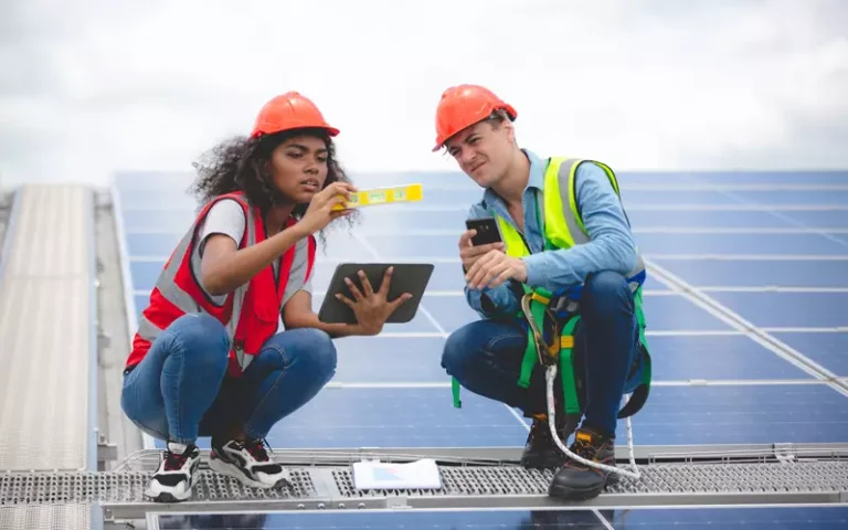 specialist-technician-professional-engineer-checking-top-view-of-installing-factory-solar-roof-panel-768x480.webp